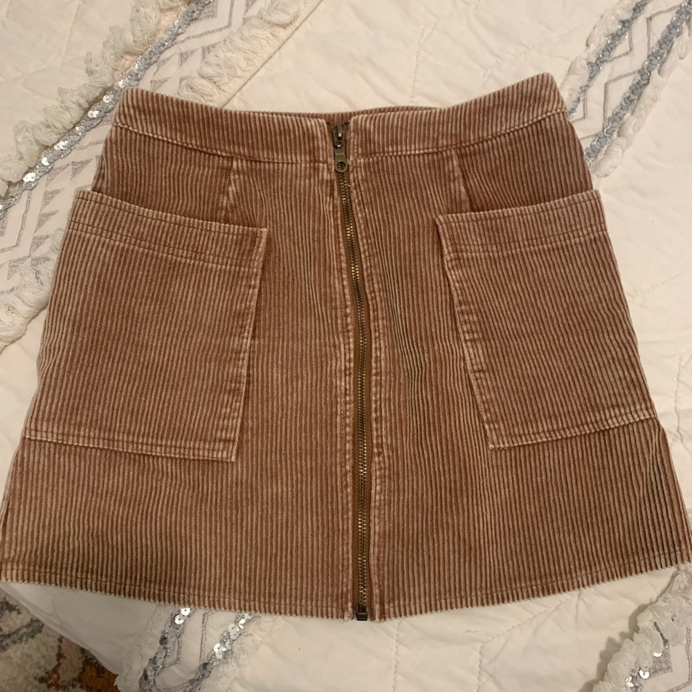 Worn once! Cute skirt with zip up Front!